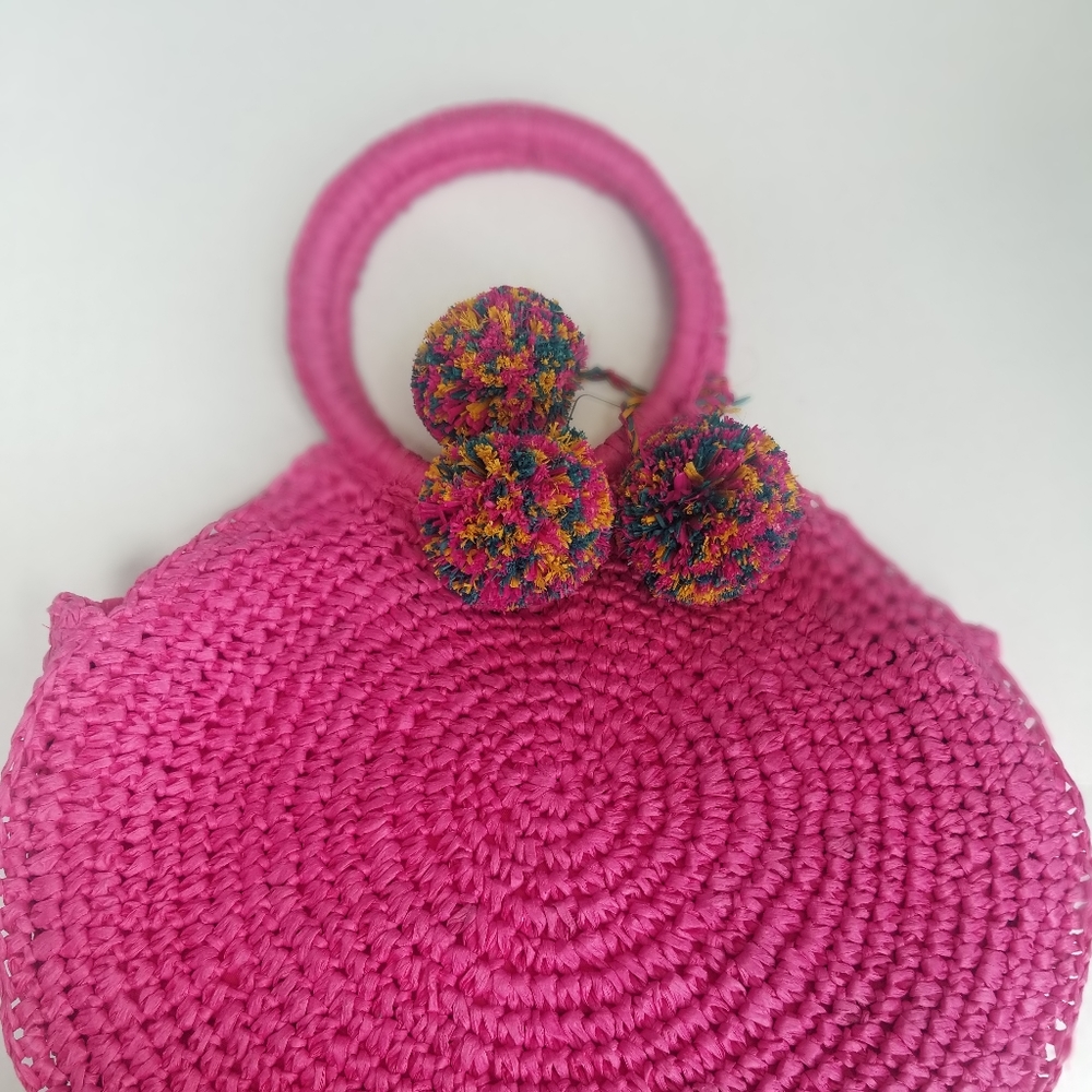 Pink pom pom bag